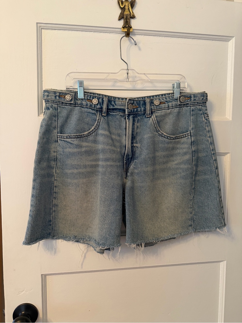 Zara Women’s Jean Shorts with Frayed Hem. Adjustable button waist. Size 12.